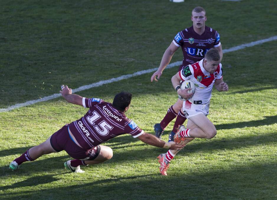 OFF TO A FLYER: Dragons young-gun Matt Dufty scored a try and laid on two others on debut against Manly on Sunday. Picture: AAP