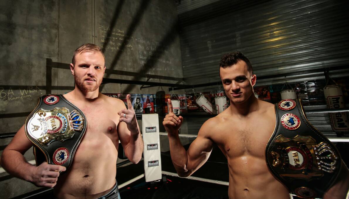 STRAPPED: Forte Boxing Academy pair Mark Lucas and Haithem Laamouz both picked up WBA title belts last week. Picture: Adam McLean