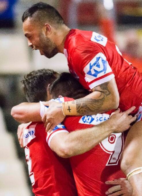 The Cutters celebrate Damien Sironen's try
