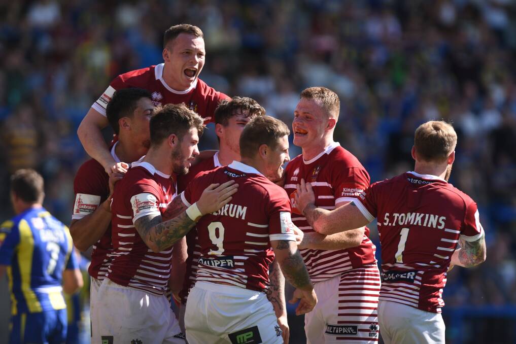 ON THEIR WAY: English powerhouse Wigan will host their round two Super League clash with Hull at WIN Stadium next year. Picture: Getty Images