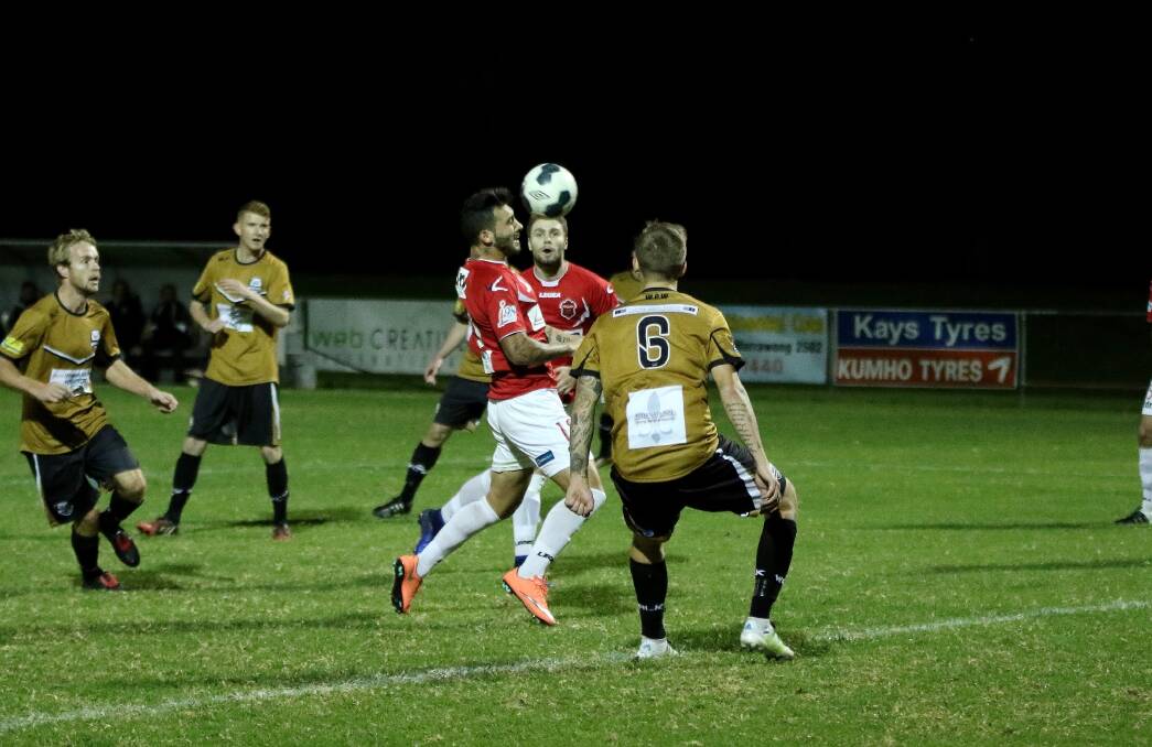 THE MOMENT: Wolves striker Nico Bernal scores the winning goal against Wagga City Wanderers on Wednesday night. Picture: PEDRO GARCIA