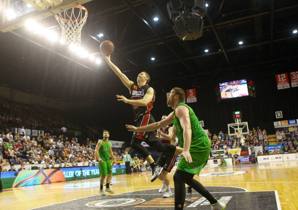 IN FULL FLIGHT: THE Hawks dominated Townsville on Saturday night. Picture: ADAM McLEAN