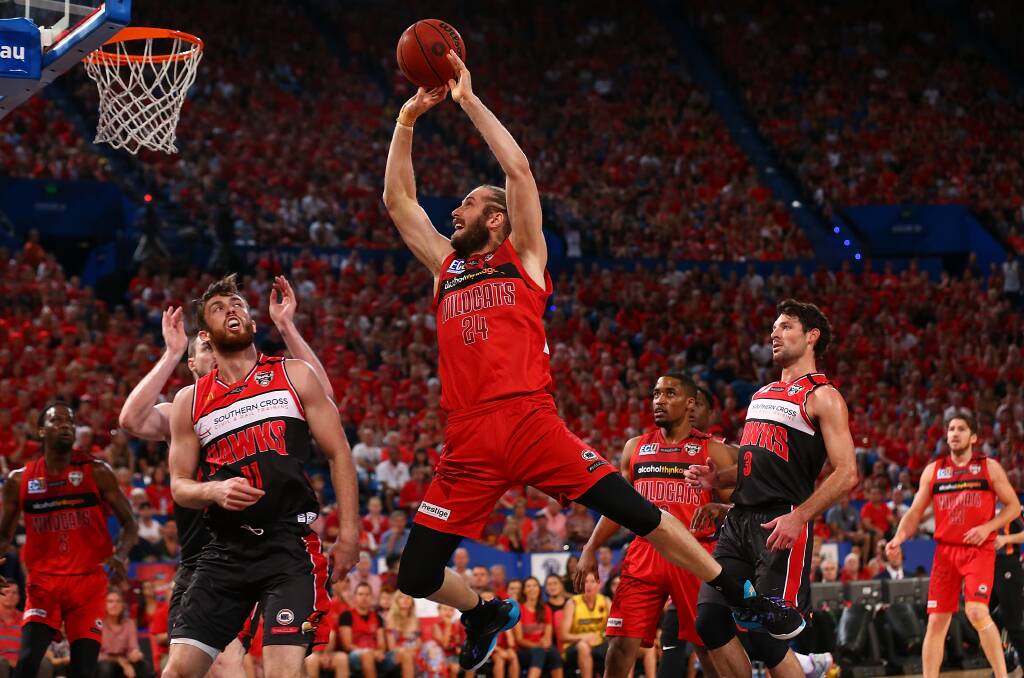 OFF THE GLASS: Perth's Jesse Wagstaff shoots during the Wildcats' game three win over Illawarra. Picture: GETTY IMAGES