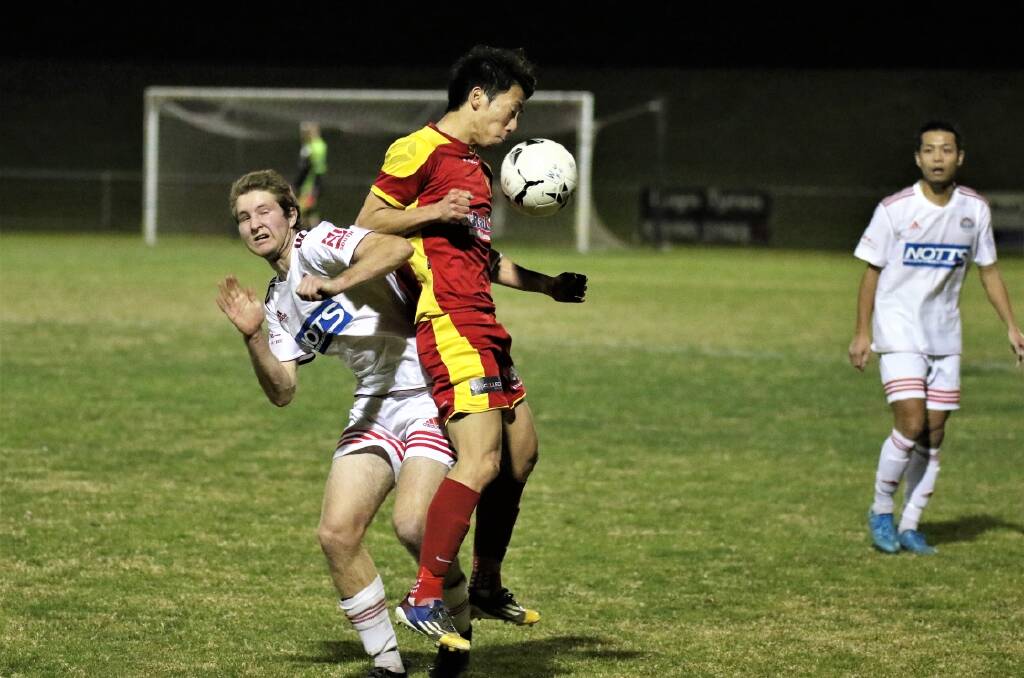 CRUCIAL VICTORY: Wollongong United's Daisuke Yuzawa and his teammates come from behind to beat Corrimal Rangers on Saturday. Picture: PEDRO GARCIA