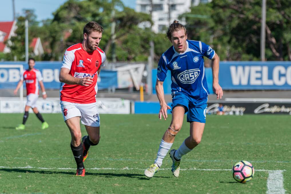 FOCUS: Wolves attacker Brett Wilson gets back in defence during last weekend's defeat to Sydney Olympic. Picture: FOOTBALL NSW
