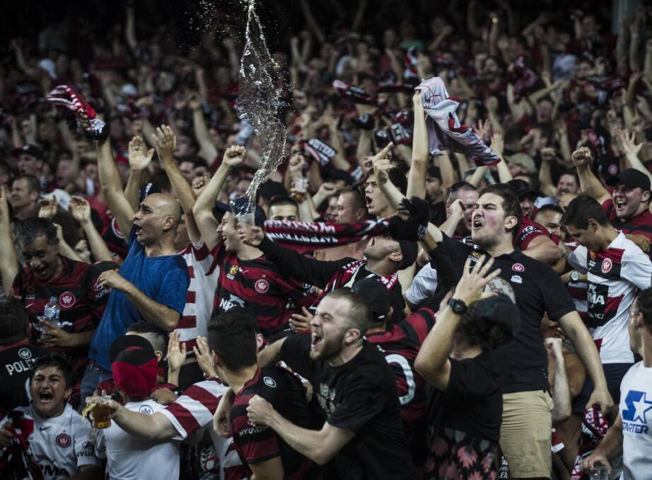 VOCAL SUPPORT: A big crowd, including what should be a packed red and black bloc of Wanderers fans, in expected at this Saturday's Sydney derby at ANZ Stadium. Picture: Dominic Lorrimer.