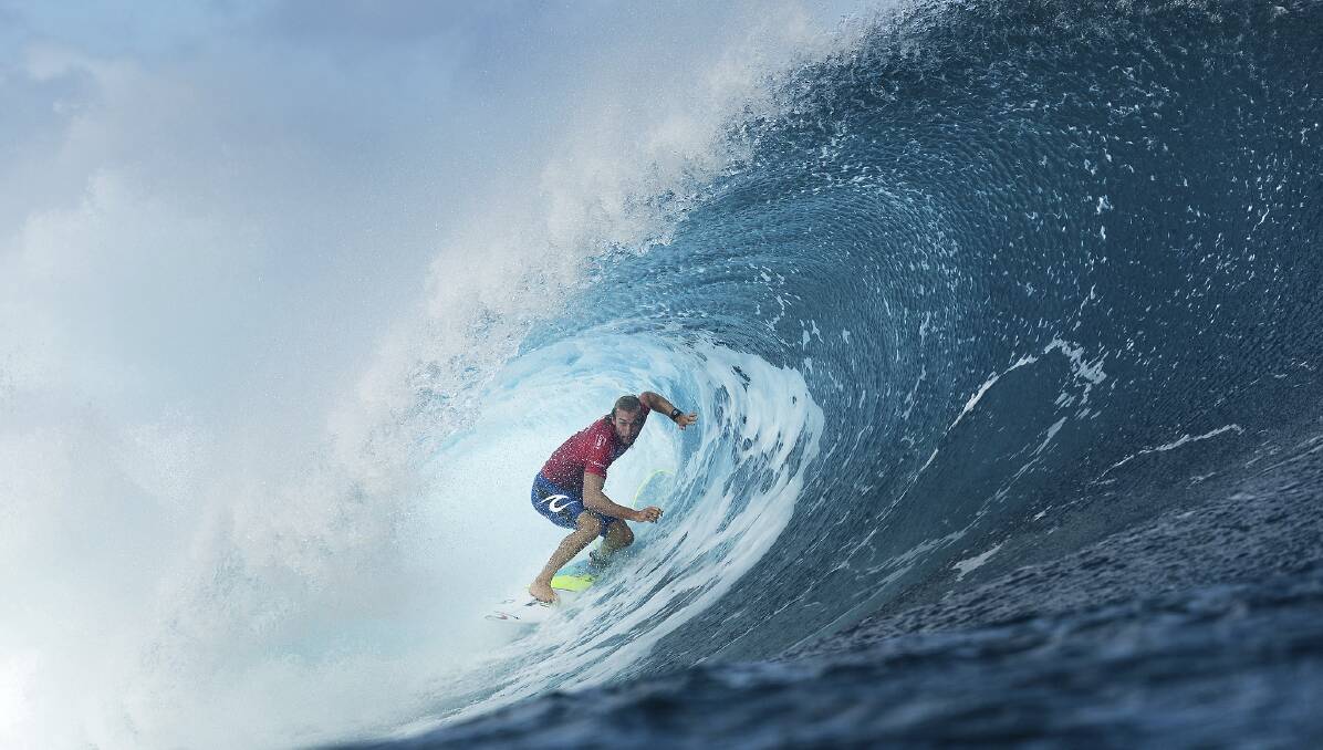 FOCUSED: Owen Wright surfing in Teahupoo last year before he was sidelined by a head injury. Picture: WSL