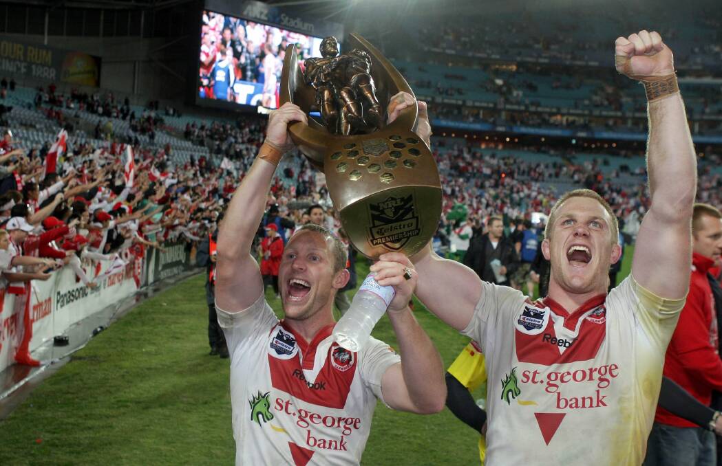 Captains courageous: Ben Hornby and Ben Creagh, both Dragons skippers, celebrate the 2010 NRL premiership. Picture: Andy Zakeli