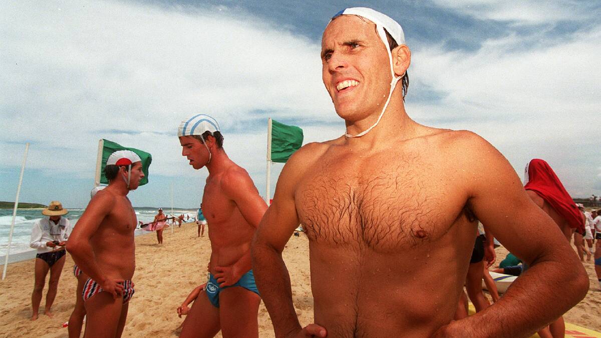 'CHAMPION': Dean Mercer during an ironman event at Windang beach in 1999. Picture: Sylvia Liber