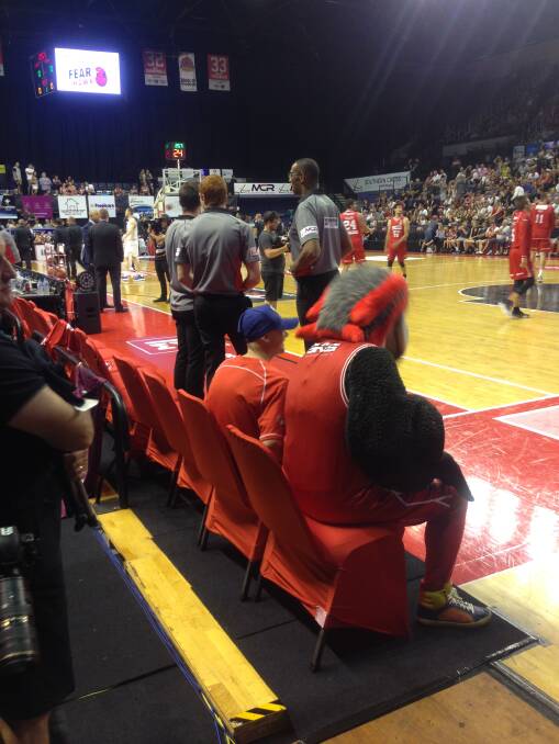Close encounter: Jayden Maloney on the Hawks bench. Picture: Supplied