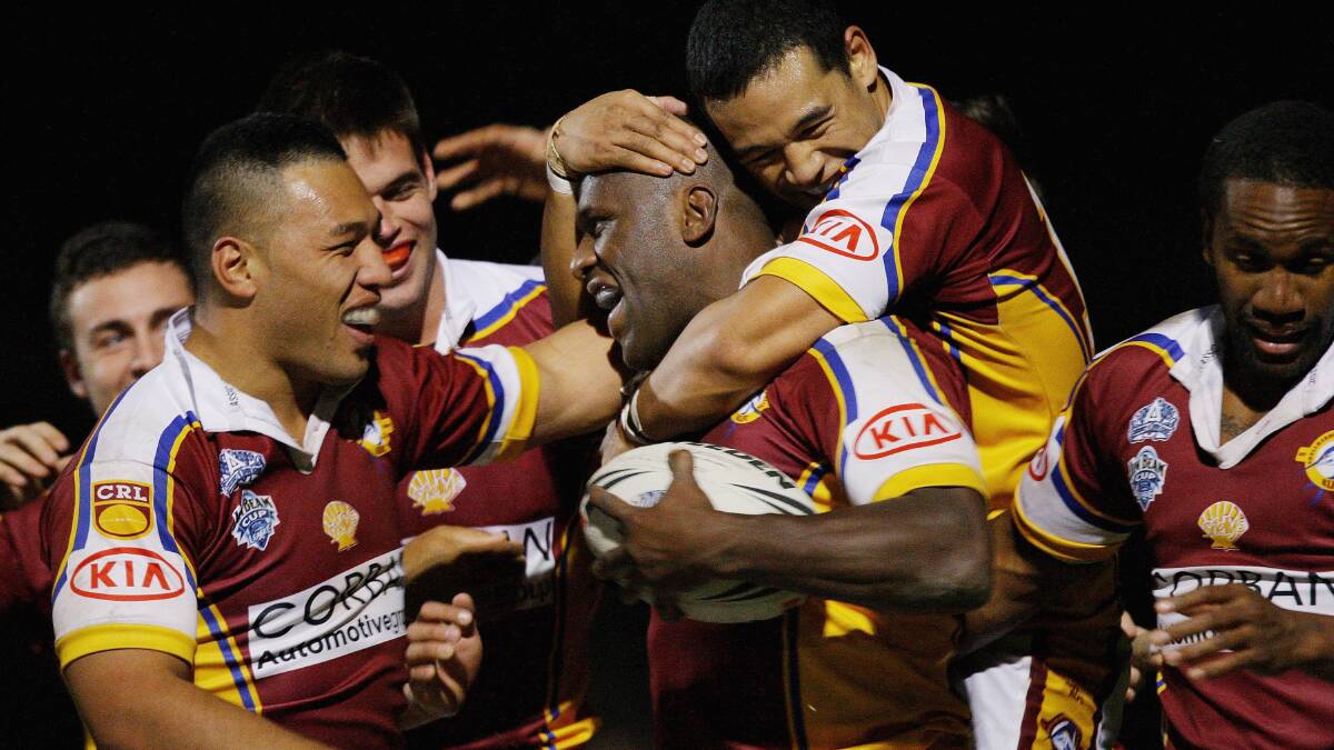 Try time: Wendell Sailor celebrates with Shellharbour Marlins teammates after scoring his first four-pointer when he returned to rugby league in 2008. Picture: Getty images