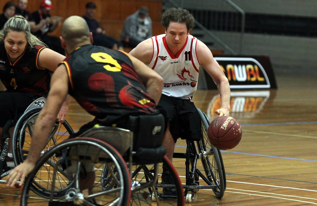 In control: Wollongong Rollerhawks star Brett Stibners during last year's National Wheelchair Basketball League. Picture: Sylvia Liber