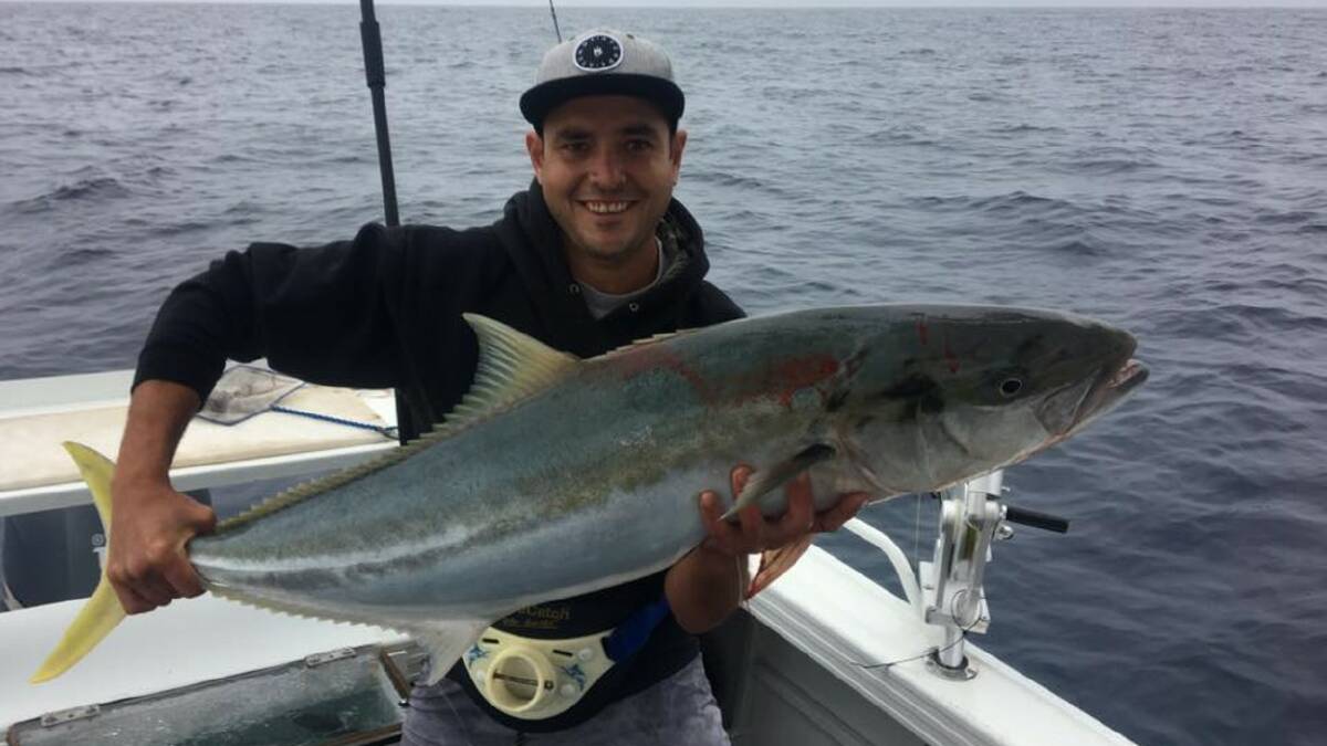 Big haul: Jason Murton with a massive 11.5kg kingfish last week. 