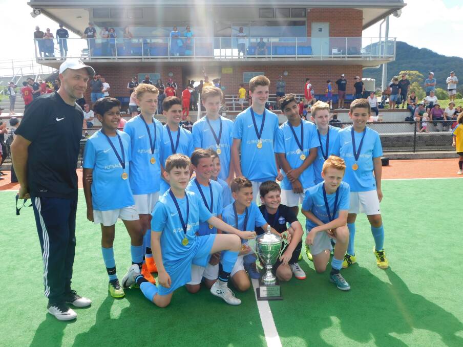 Success: Sydney's Futsal Institute with the champions trophy. 