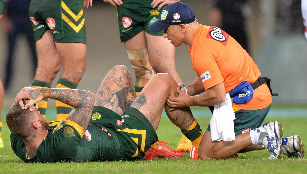 Pain barrier: Josh Dugan injured his knee in his Test debut, but will have a second chance when Australia take on New Zealand next week. 