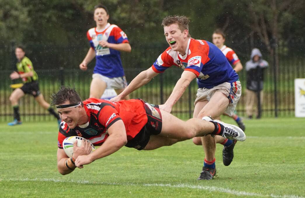 Over: Kiama's Tom Angel scores as the Knights won the Group Seven under 18 premiership at Collegians Sports Complex. Picture: Tim Delaney