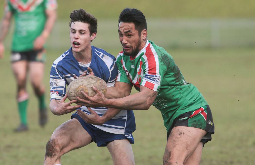 Magic touch: Former Corrimal player Patrick Herbert (right) has been in form for the Dragons in the National Youth Cup competition. 