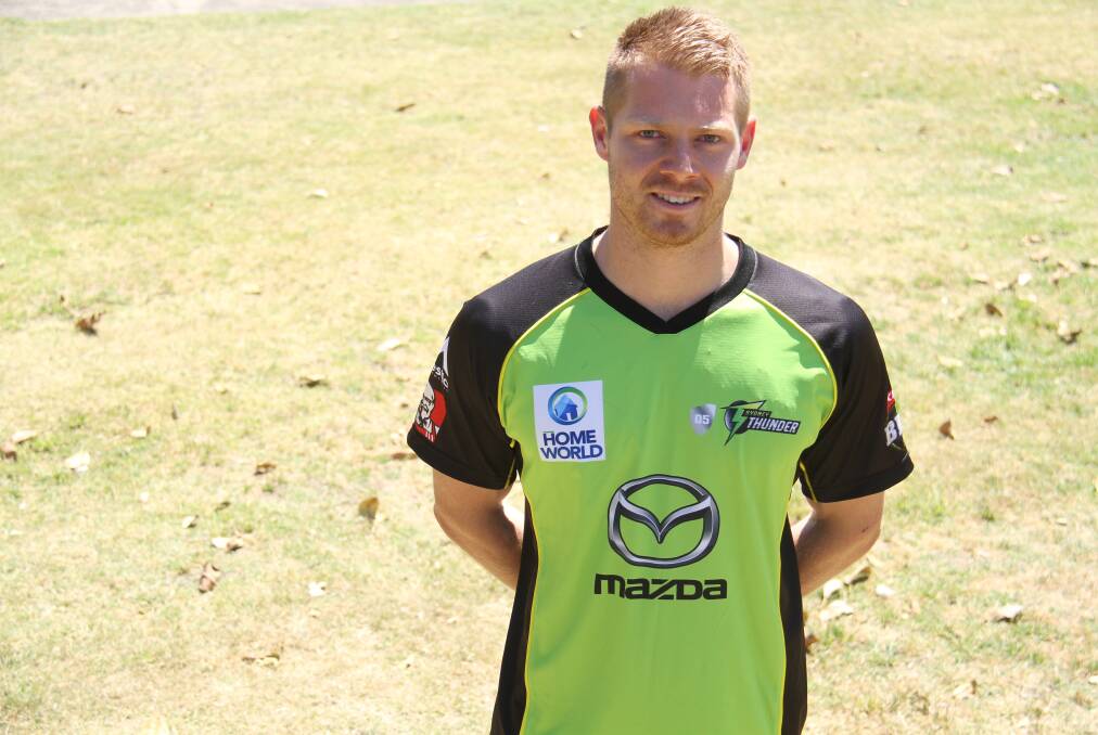 Green machine: Sydney Thunder signing Nathan McAndrew.