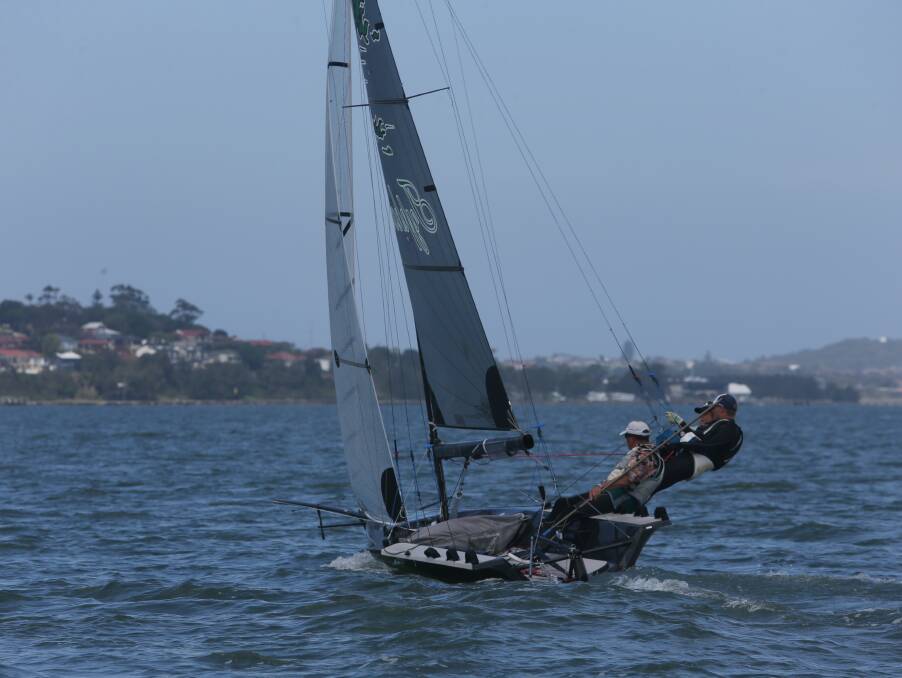 HANGING OUT: Manly's Craig Nicholls considers his options during a heat of the 16-foot skiff national titles on Lake Illawarra.