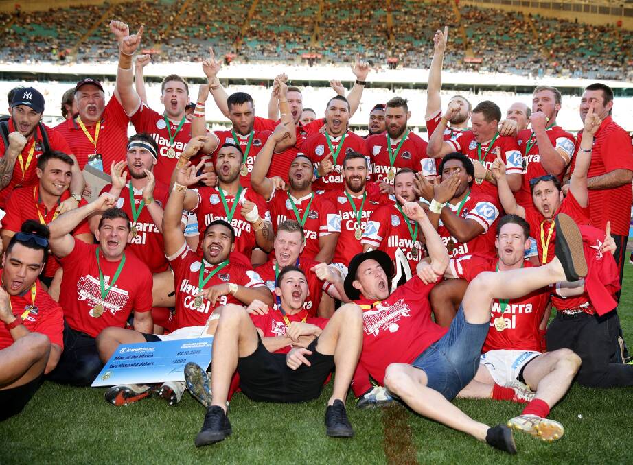 Scarlet and white delight: Jason Demetriou and the Illawarra Cutters celebrate winning the NRL State Challenge final at ANZ Stadium, beating Burleigh 54-12. Picture: Getty Images