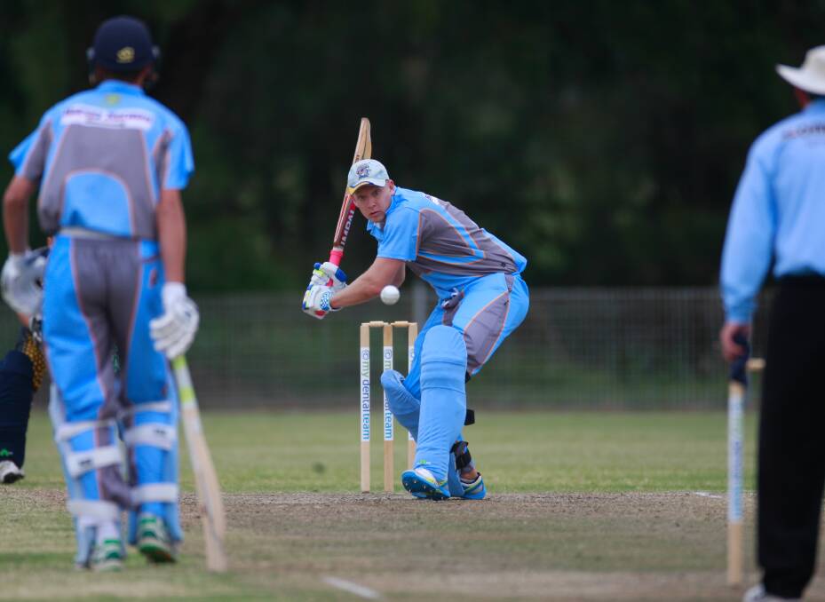 On the attack: Oak Flats batsman Scott McAndrew gets on the front foot in Saturday's match against Lake Illawarra at Howard Fowles Oval. Picture: Georgia Matts