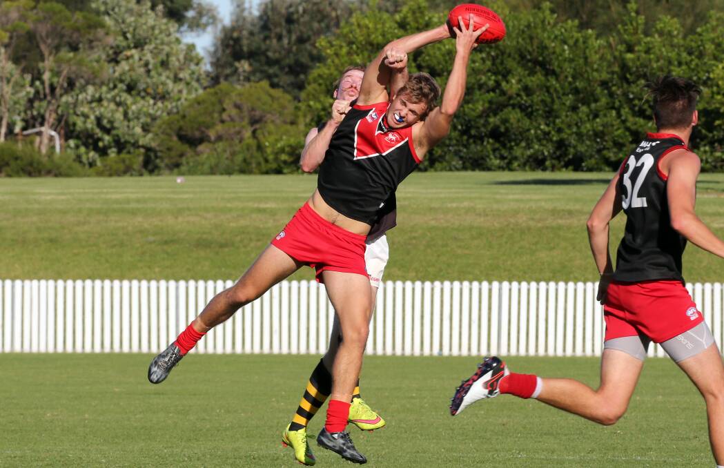 High fly: Lions forward Daniel Leary, pictured against Bomaderry earlier this season, booted eight goals in a 168-point win over Shellharbour. Picture: Robert Peet