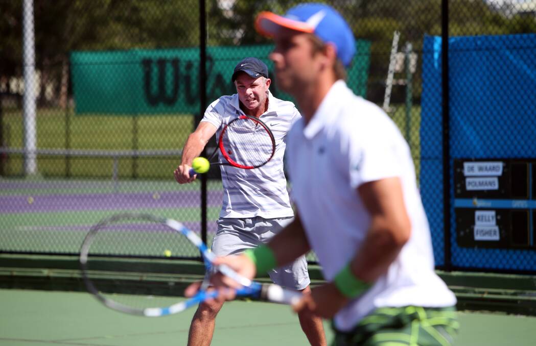 Second solution: Dayne Kelly (right) with Ashley Fisher in the Wollongong International doubles tournament at Beaton Park. 