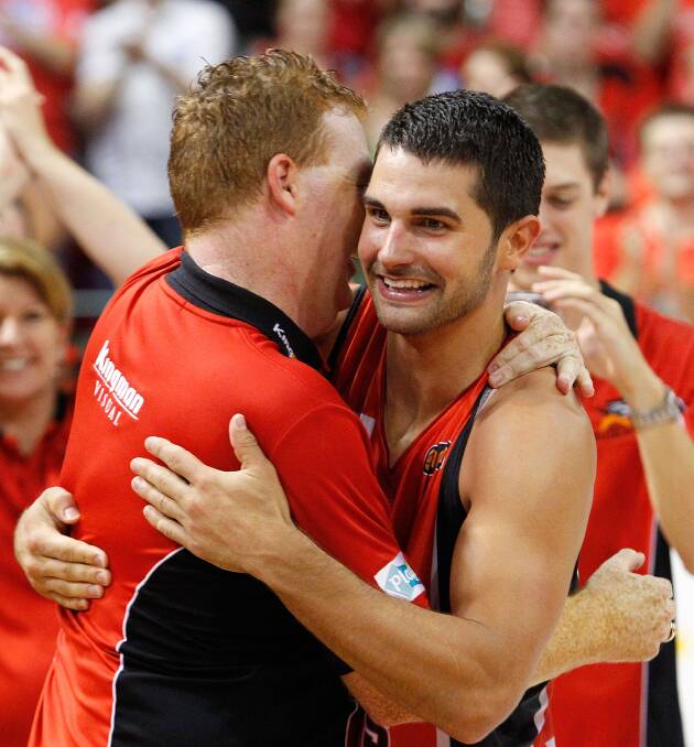Dynamic duo: Rob Beveridge (left) and Kevin Lisch celebrate beating the Hawks with Perth in the 2009-10 grand final series. Picture: Getty Images