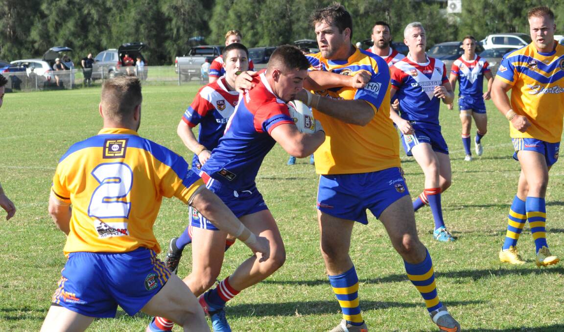 Gorilla grip: Warilla coach Aaron Henry in defence against premiers Gerringong. They take on Port Kembla on Sunday. Picture: Courtney Ward