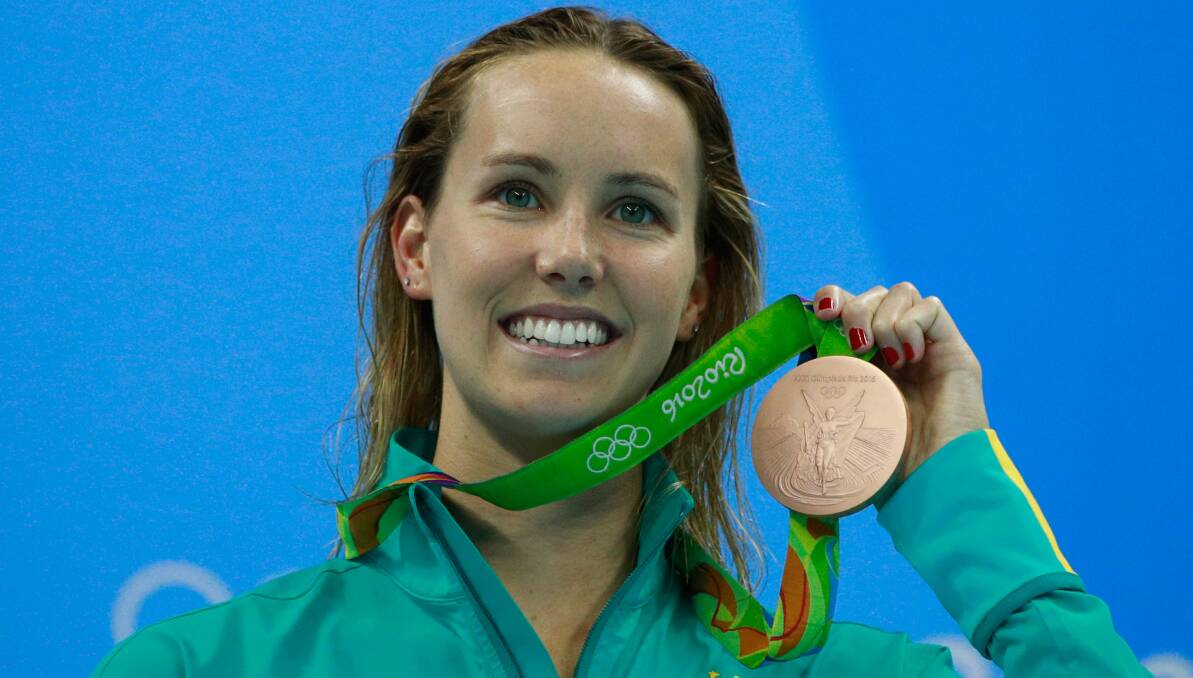 Medal moment: Wollongong's Emma McKeon shows off her bronze from the 200m freestyle final at the Rio Olympics. Picture: Getty Images