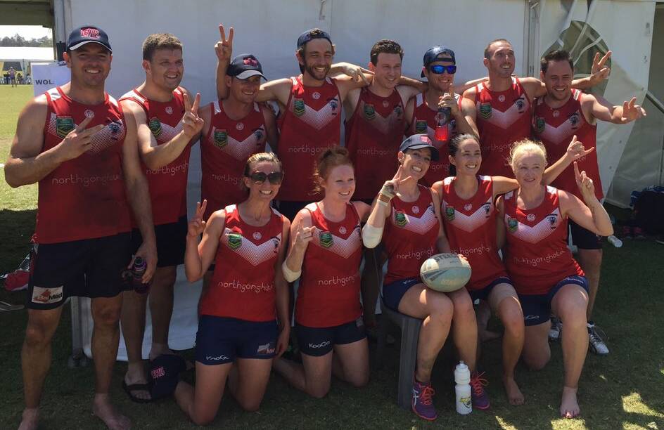 DEVILS' DELIGHT: The Wollongong senior mixed squad celebrate winning a second straight State Cup title at Port Macquarie. 
