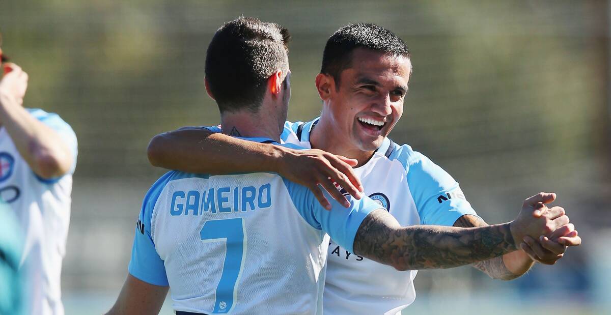 Better days ahead: Corey Gameiro with Socceroos great and Melbourne City teammate Tim Cahill before the injury. Picture: Getty Images