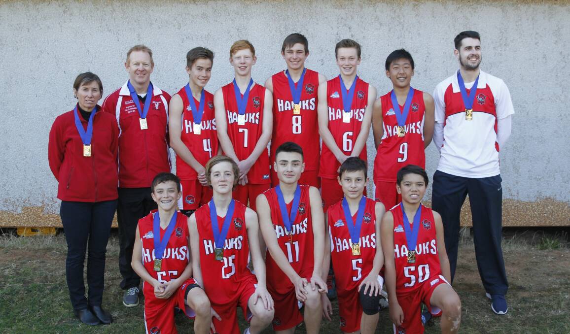 On top: The Illawarra Hawks under 14 squad with their medals after winning the Country Premier League final. Picture: Branka Piljevic 