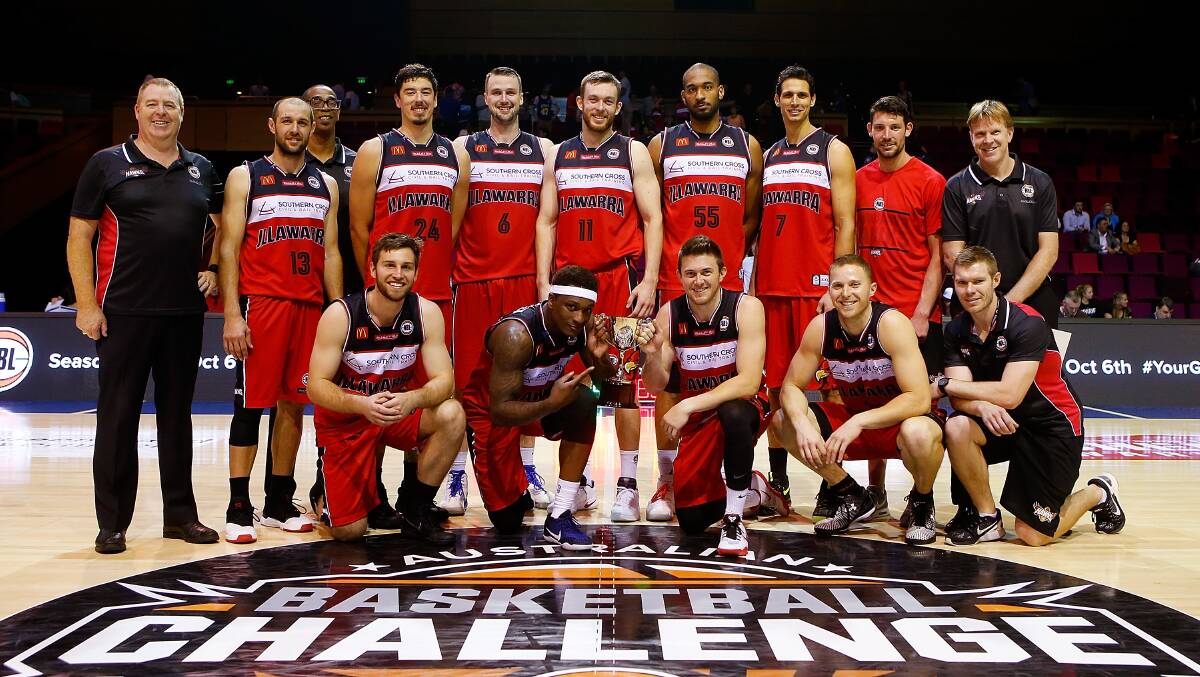 Unbeaten: Illawarra Hawks celebrate winning the Australian Basketball Championship pre-season tournament in Brisbane. Picture: GETTY IMAGES