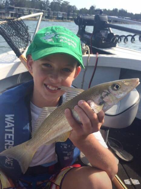 Reeled in: Brock Evans with a whiting after a recent fishing expedition. 