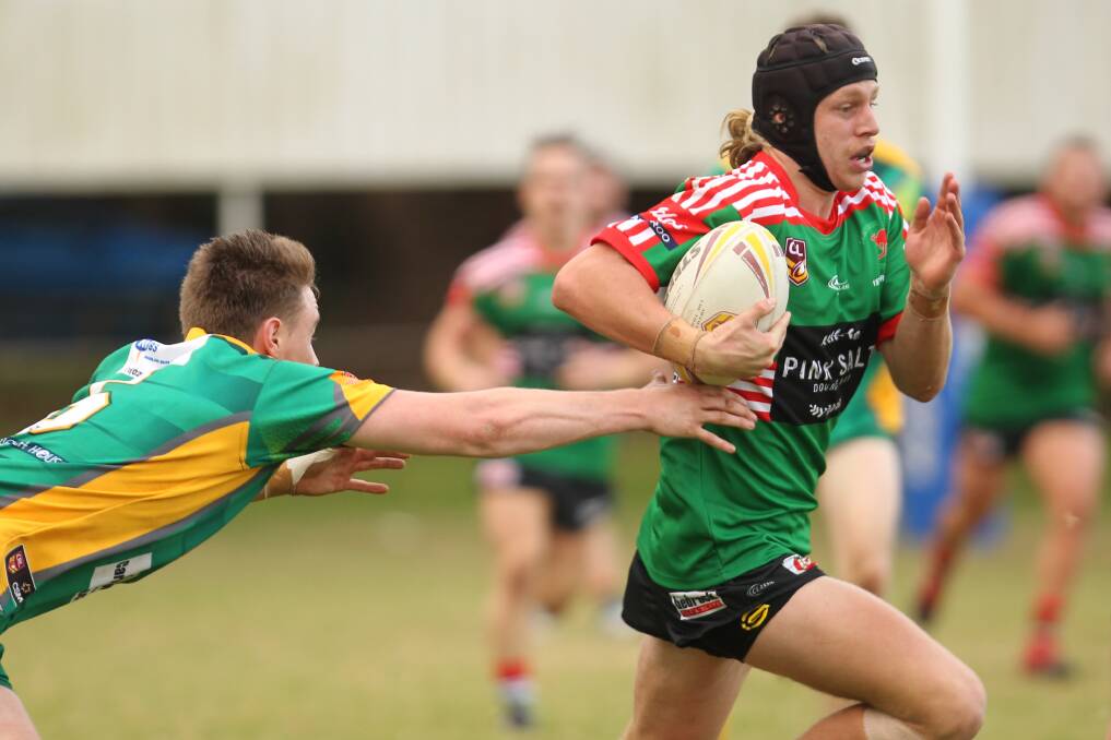 Roo beauty: Young Jamberoo talent Dean Watling runs into open space in the victory over the Stingrays. Picture: David Hall