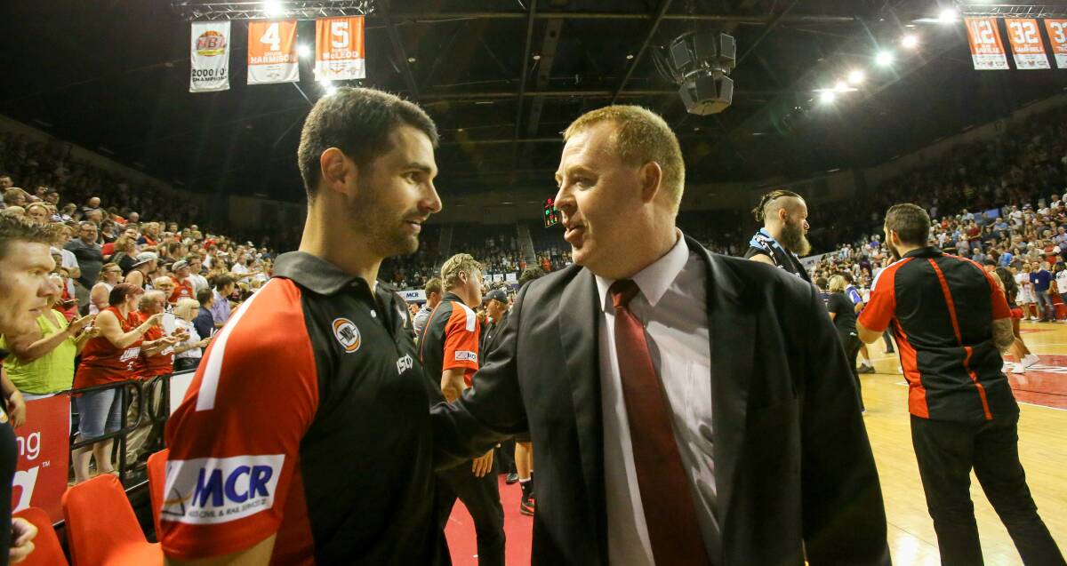 Torn apart: NBL MVP Kevin Lisch (left) with Hawks coach Rob Beveridge led Illawarra to the semi-finals this season. 