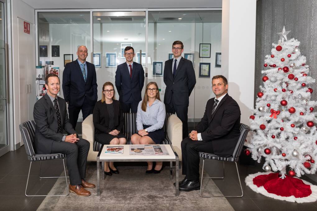 Working hard for you: The dedicated RMB Lawyers (standing L to R) Adam Barlow, Bradley Peterson, James Parrish (seated L to R) Josh Bignell, Olivia Yeaman, Meg Connell and Michael Lewis.