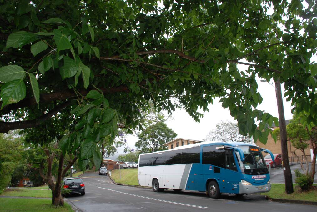 GHOSTING: An empty TIG5 bus prepares to depart The Illawarra Grammar School on Friday, three days after students stopped attending. Picture: Angela Thompson