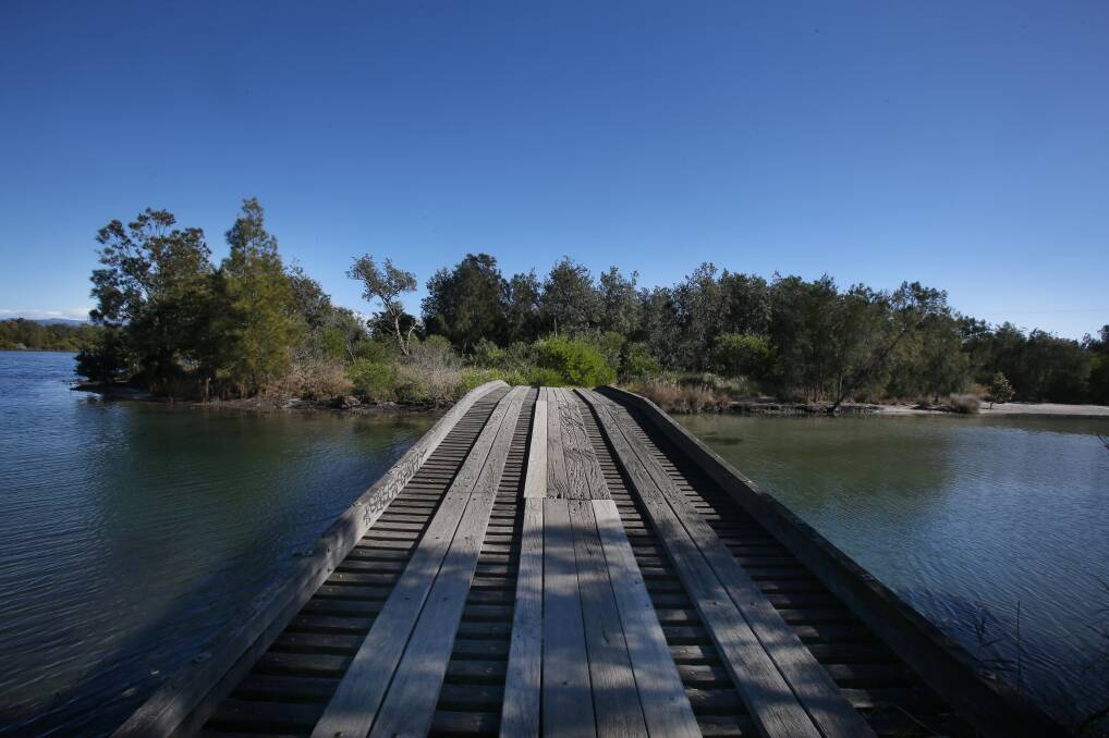 TENT PITCHED: A footbridge from Reddall Reserve leads to Picnic Island. Picture: Robert Peet