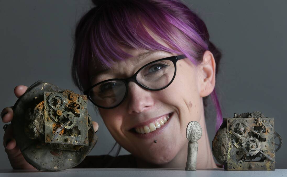 Old treasures: Clocks and a tiny porcelain children's toy were among the artefacts uncovered by Lian Flannery and her team during an excavation at the former Dwyer's site last year. Picture: Robert Peet