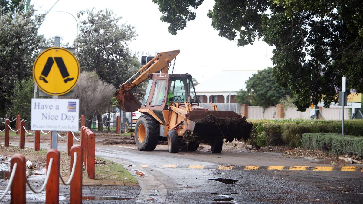  A backhoe clears debris from the Jettys entry. Picture: Sylvia Liber