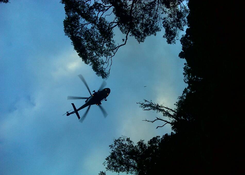 A chopper hovers over the rescue site. Picture: NSW SES