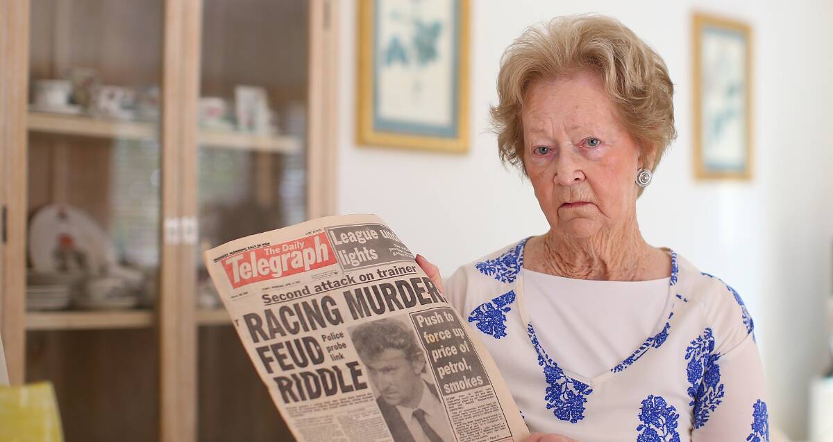 STILL WAITING: Jean O'Leary keeps a collection of newspaper clippings that chronicle the police investigation into her brother's unsolved murder.Picture: Chris Hyde
