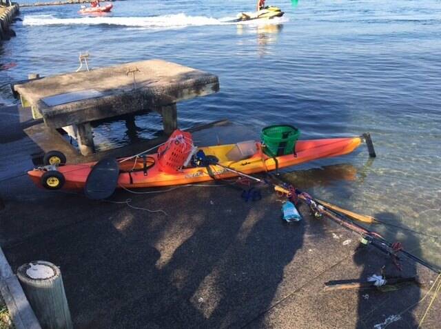 The kayak was laden with fishing equipment and had lines set when it was found capsized and unmanned. Source: NSW Police