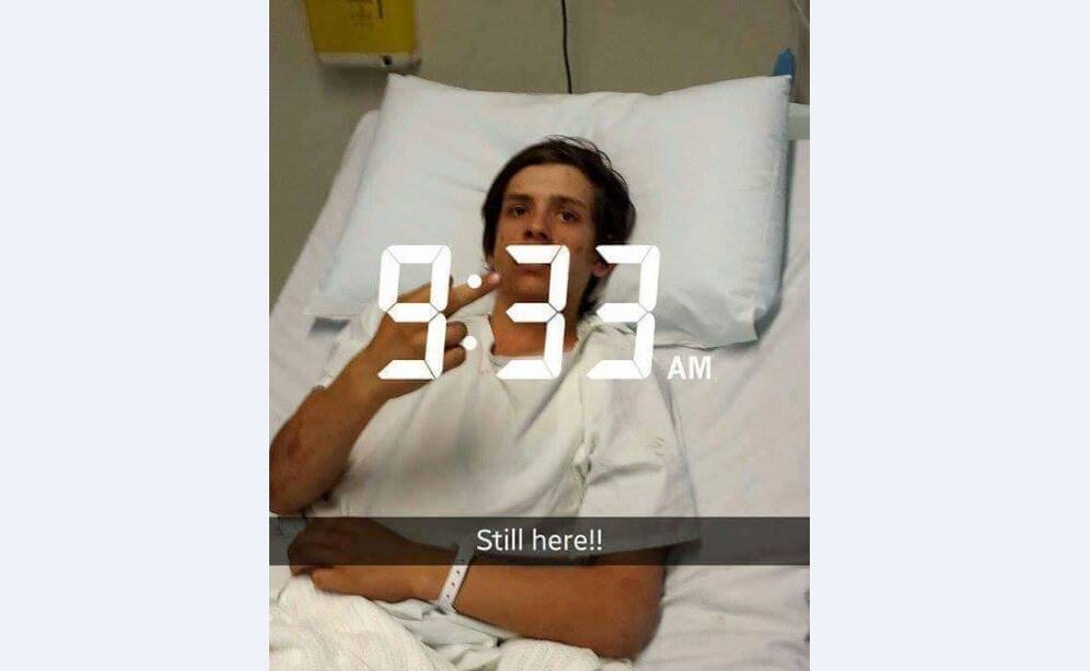 Jye McWatters appeared defiant in a picture taken from his hospital bed in April, following an alleged hammer attack at his Warilla home. Source: Facebook