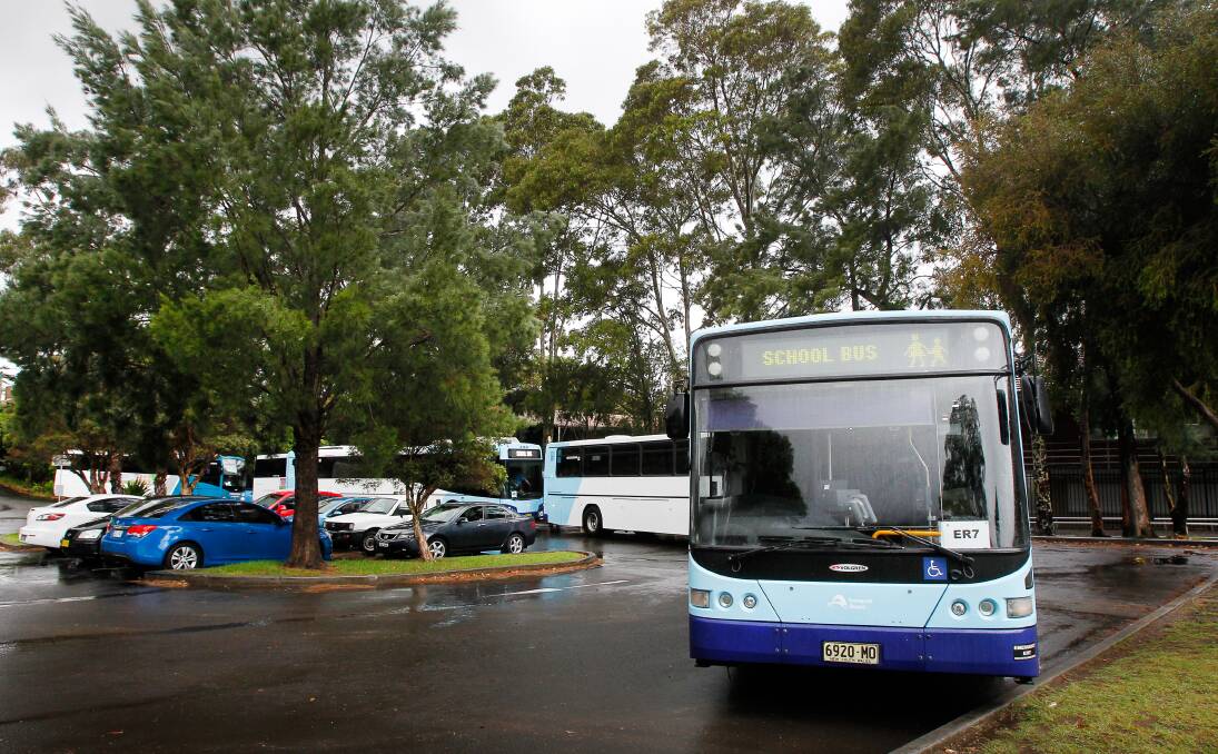 NO ONE ABOARD: Five empty buses prepare to depart Edmund Rice College on Thursday, more than a week after students began their summer holidays. Picture: Sylvia Liber