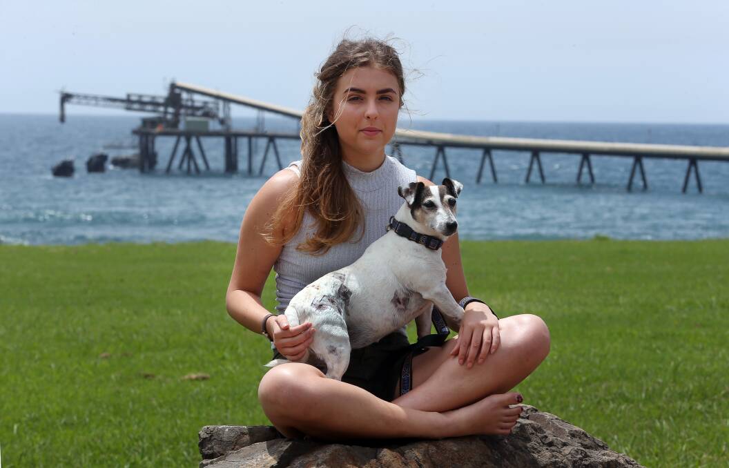 HYSTERICAL: Brooke Wightman tried in vain to stop the attack on her nine-year-old pet, Coco. Picture: Robert Peet