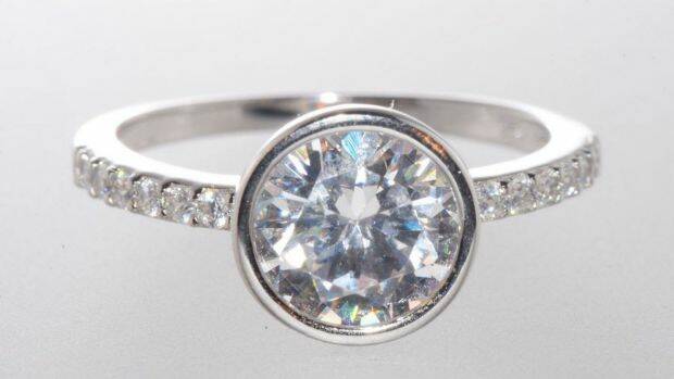Page used cucubic zirconia in his friend's wedding ring, but told him it was diamond. 
