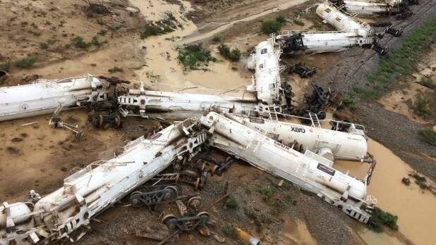 The derailed train was carrying 819,000 litres of sulphuric acid. Photo: Queensland Police